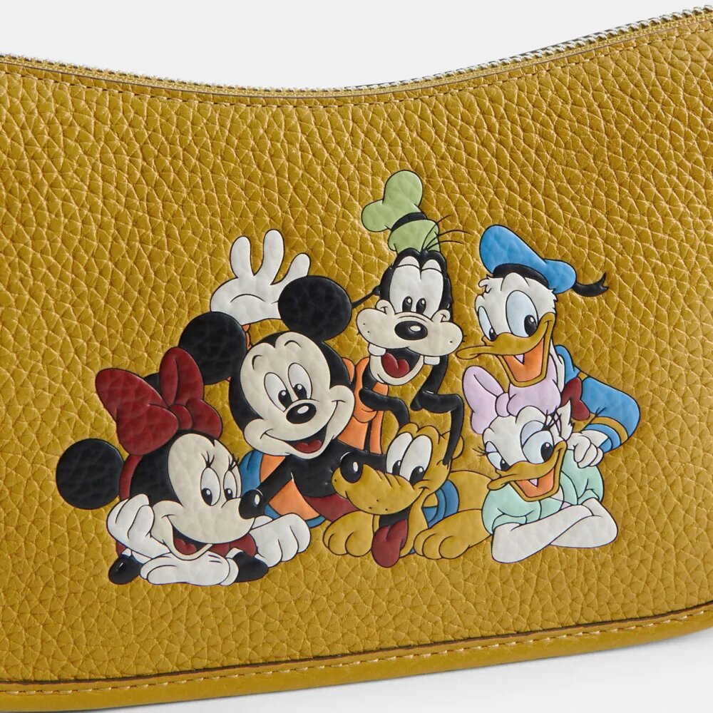 Disney X Coach Swinger-taske i regenereret læder med Mickey Mouse og venner
