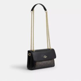 Elodie crossbody-taske 18 i Signature Canvas