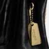 Elodie crossbody-taske 18 i Signature Canvas