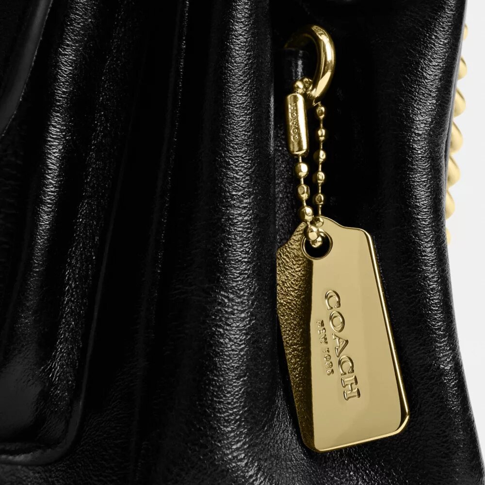 Elodie crossbody-taske 18 i Signature Canvas