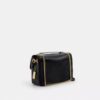 Elodie crossbody-taske i Signature Canvas