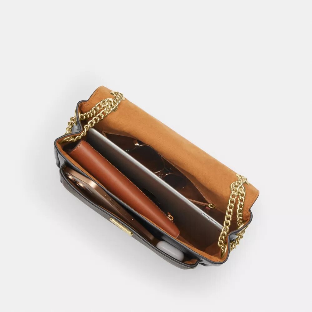 Elodie crossbody-taske i Signature Canvas