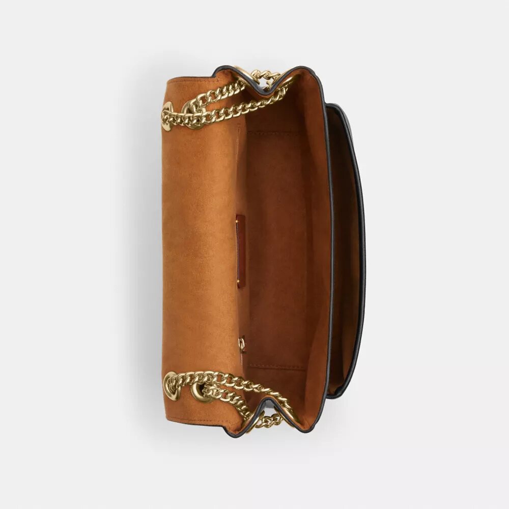 Elodie crossbody-taske i Signature Canvas