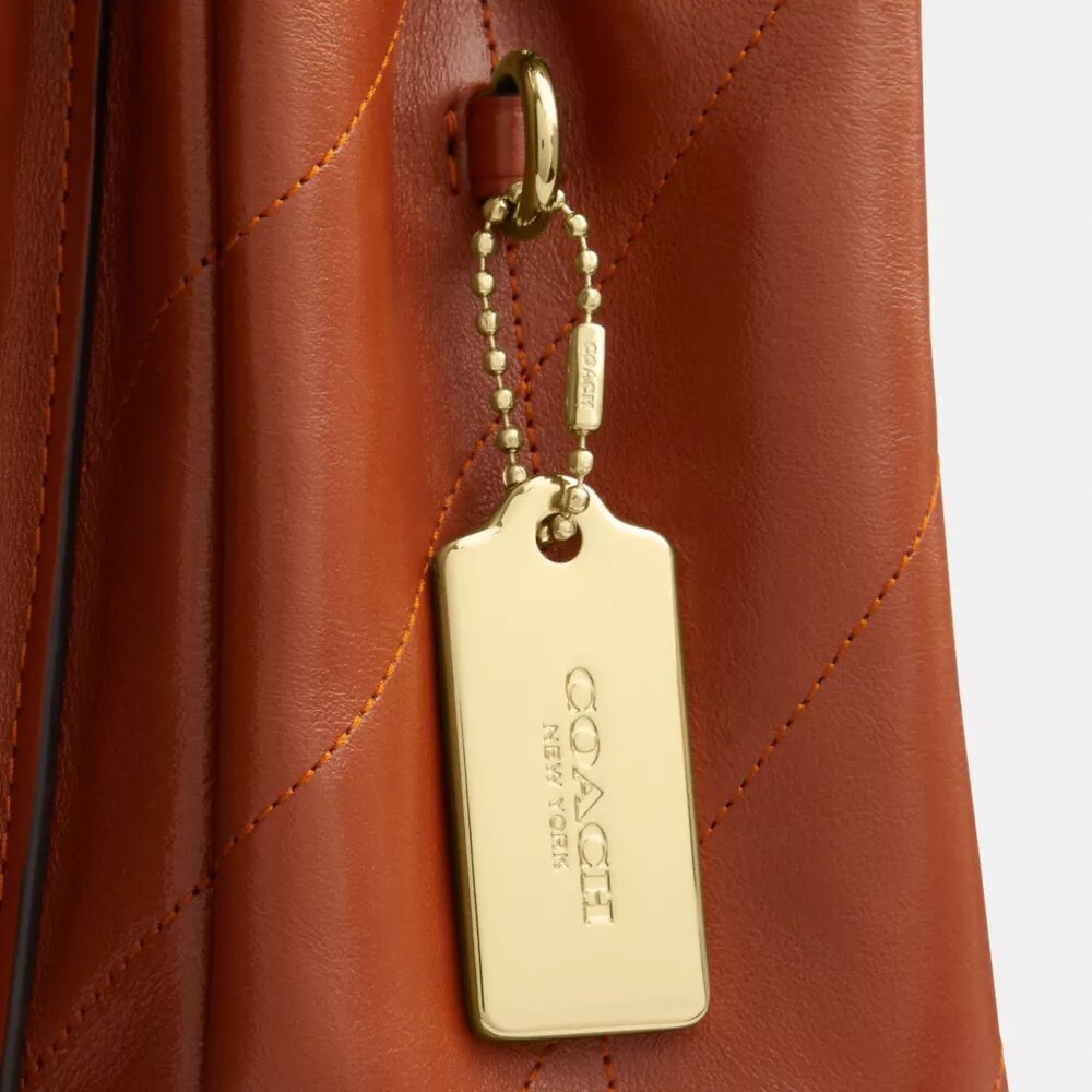 Elodie crossbody-taske med quiltning