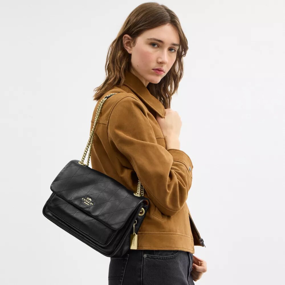 Elodie crossbody-taske med quiltning