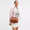 Elodie crossbody-taske med quiltning