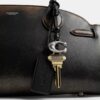 Empire Carryall-tasker 34 i patineret læder