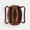 Erin skuldertaske i Signature Canvas