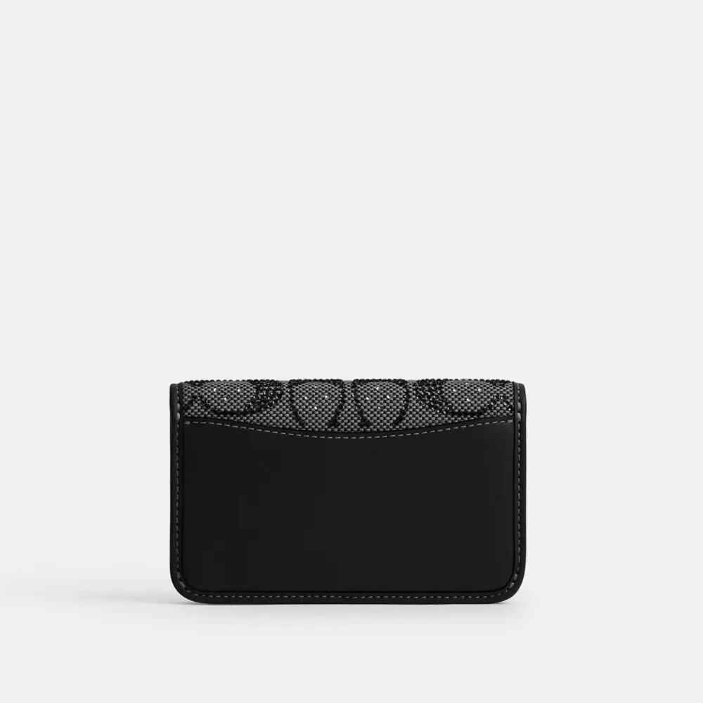 Essential slankt kortetui i Crystal Signature Jacquard