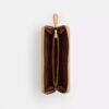 Essential Slim Accordion Zip-punge i vores signatur-jacquard