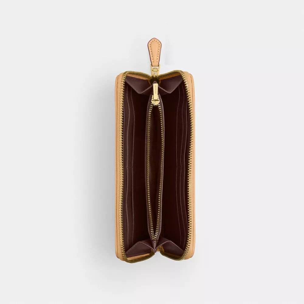 Essential Slim Accordion Zip-punge i vores signatur-jacquard