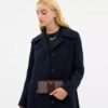 Essential Slim Accordion Zip-punge i vores signatur-jacquard