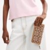 Essential Slim Accordion Zip-punge i vores signatur-jacquard