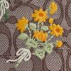 Faye Minitask i signatur-jacquard med blomsterbroderi