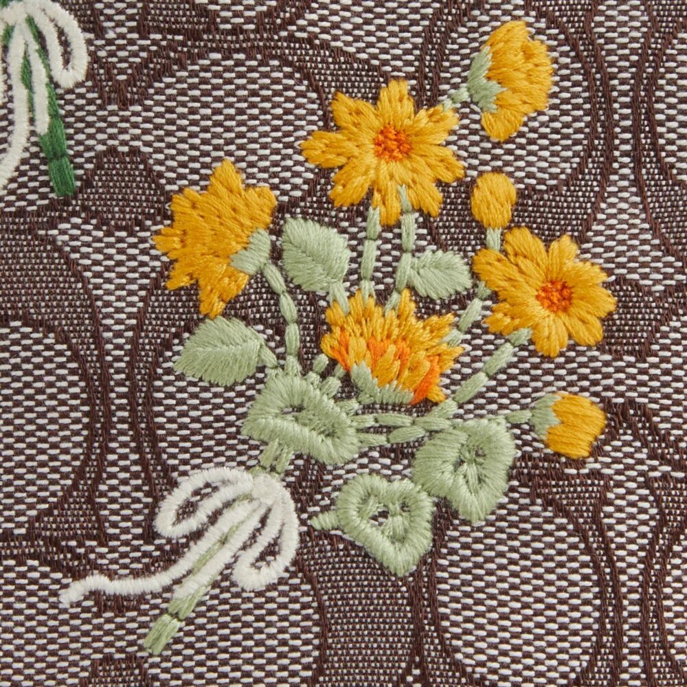 Faye Minitask i signatur-jacquard med blomsterbroderi