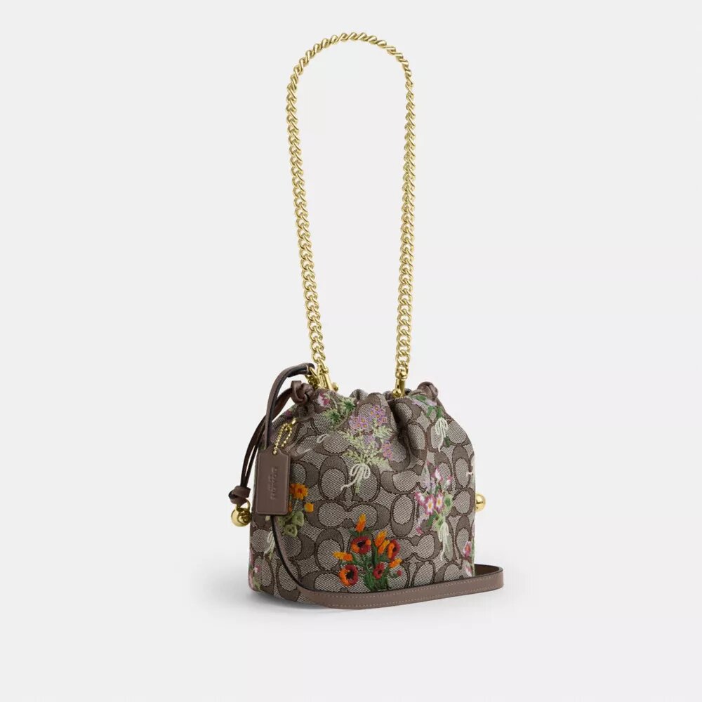 Faye Minitask i signatur-jacquard med blomsterbroderi