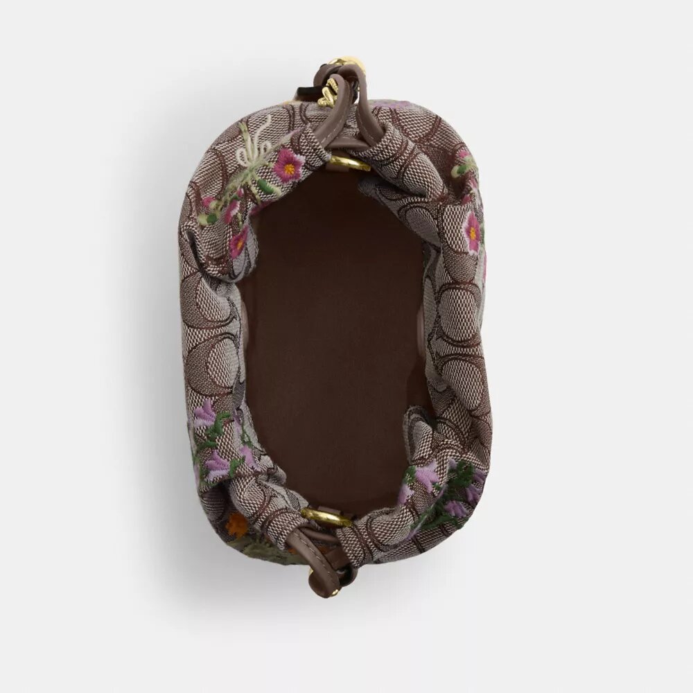 Faye Minitask i signatur-jacquard med blomsterbroderi
