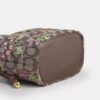 Faye Minitask i signatur-jacquard med blomsterbroderi