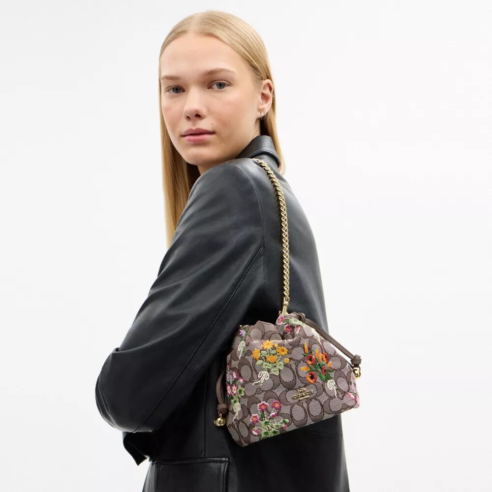 Faye Minitask i signatur-jacquard med blomsterbroderi