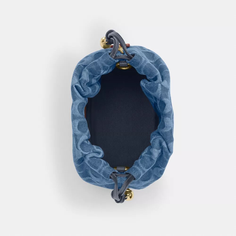 Faye Minitasker i signaturdenim