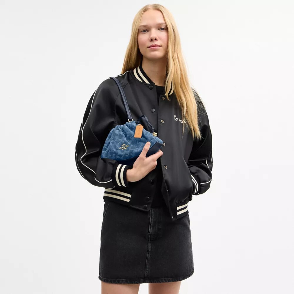 Faye skuldertaske i signaturdenim