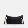 Finn crossbody-taske med lommer