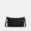 Finn crossbody-taske med lommer