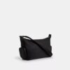 Finn crossbody-taske med lommer