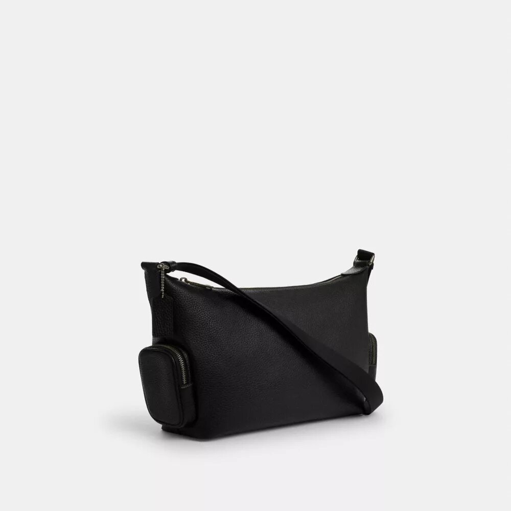 Finn crossbody-taske med lommer