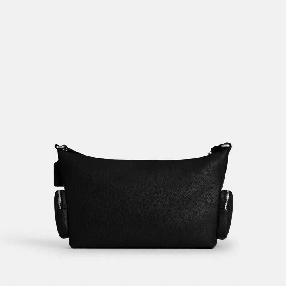 Finn crossbody-taske med lommer