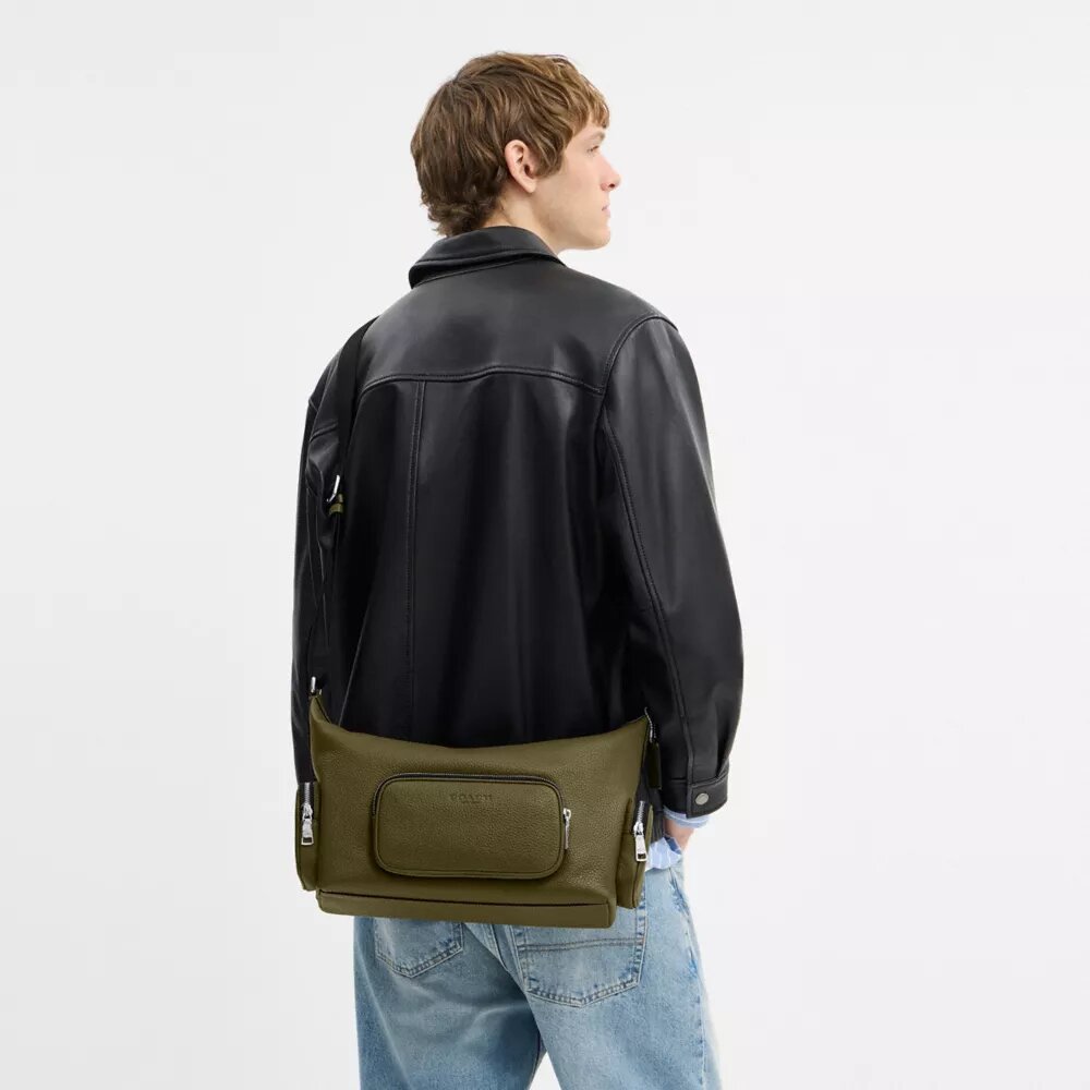 Finn crossbody-taske med lommer