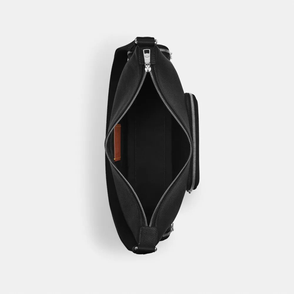Finn crossbody-taske med lommer