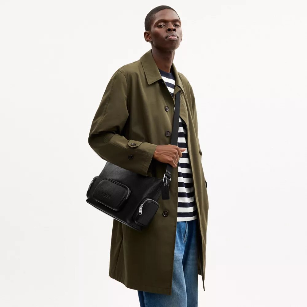 Finn crossbody-taske med lommer