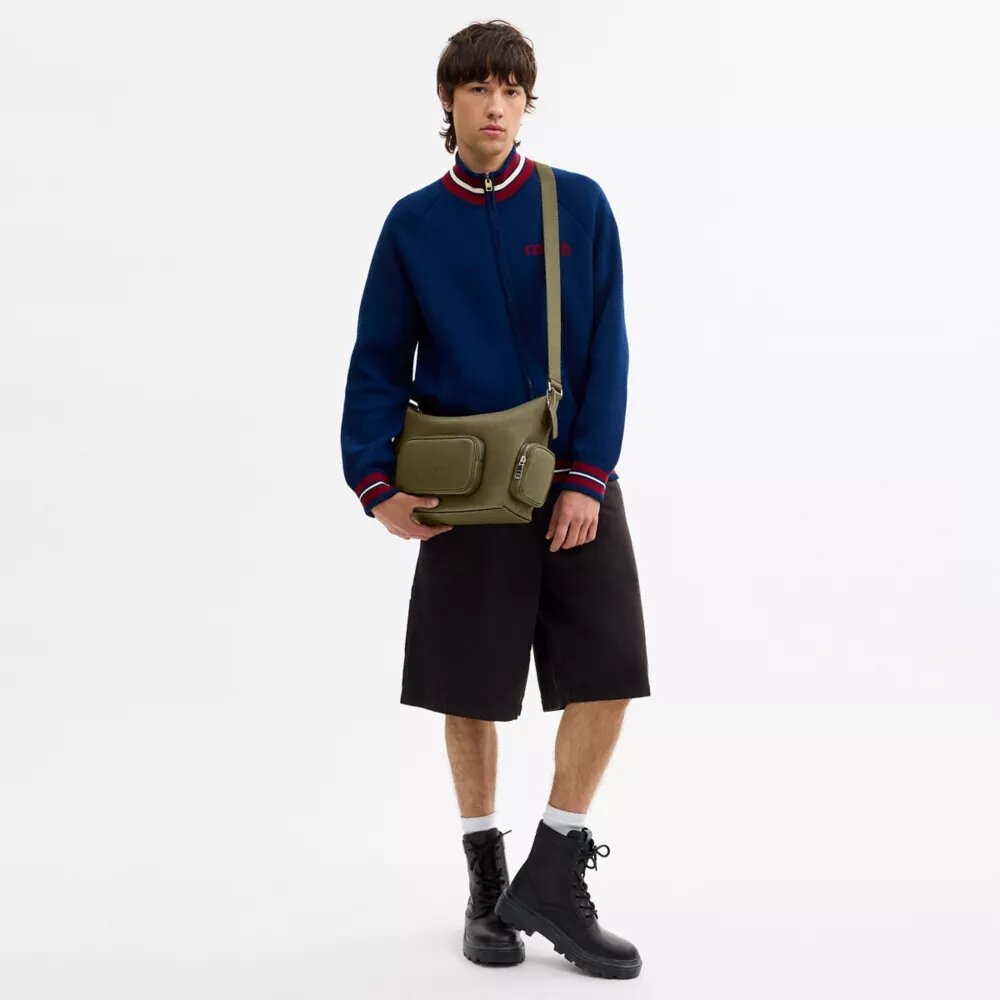 Finn crossbody-taske med lommer