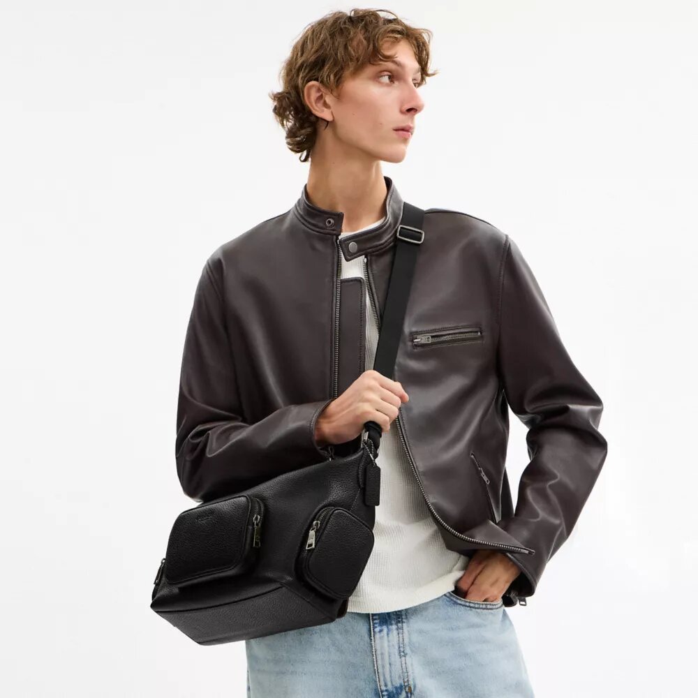 Finn crossbody-taske med lommer