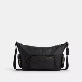 Finn crossbody-taske med lommer i Signature Canvas