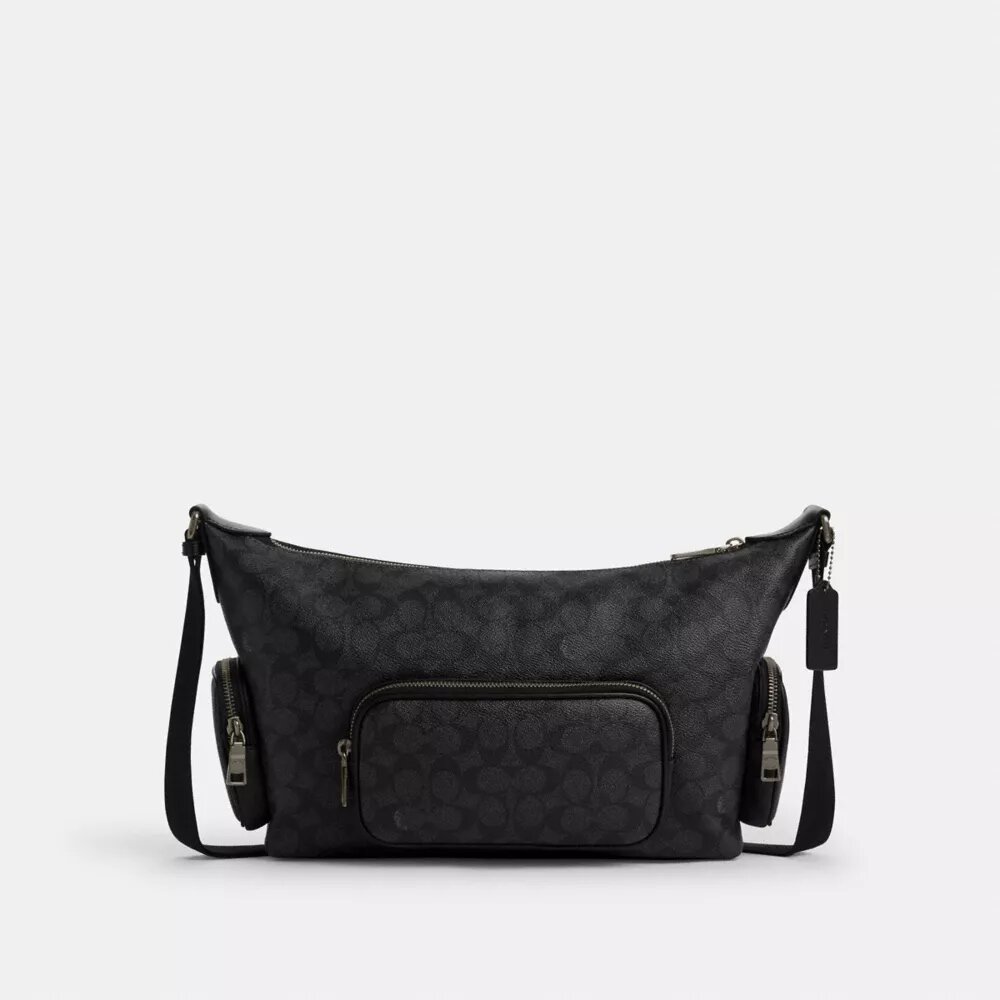 Finn crossbody-taske med lommer i Signature Canvas