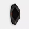 Finn crossbody-taske med lommer i Signature Canvas