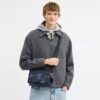 Graham Crossbody-taske i signatur-camouflagemønster