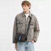 Graham crossbody-taske i Signature Canvas med varsity-striber