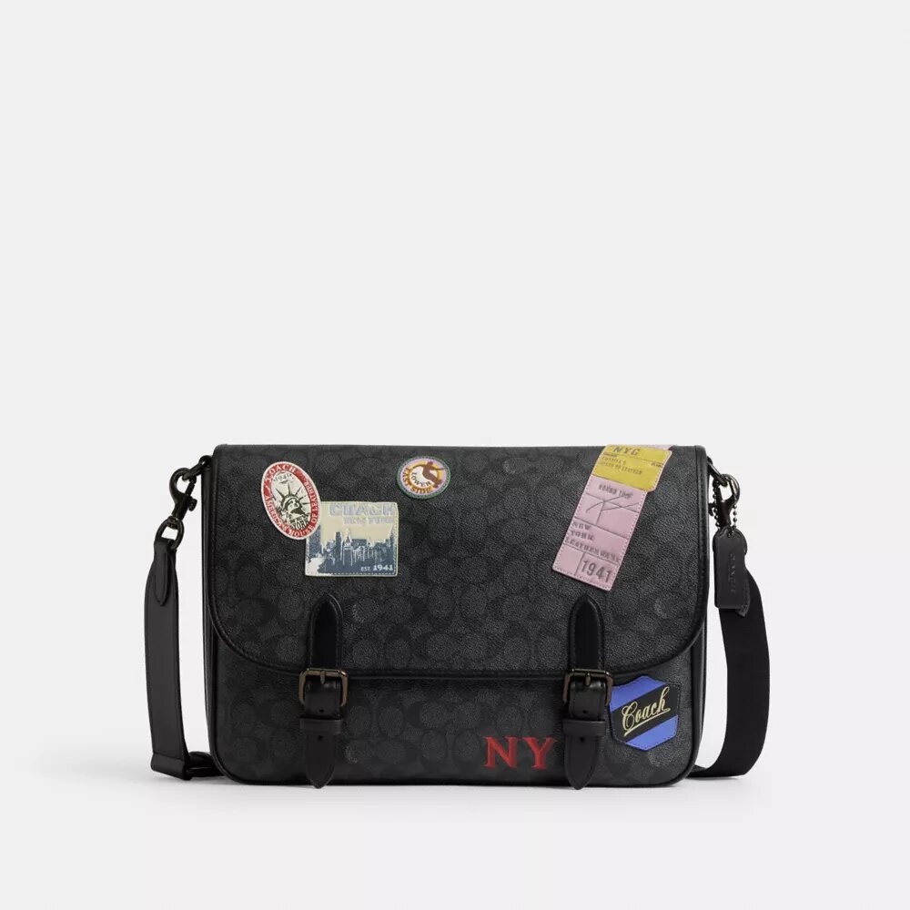 Hitch-messengertaske i Signature Canvas med patches
