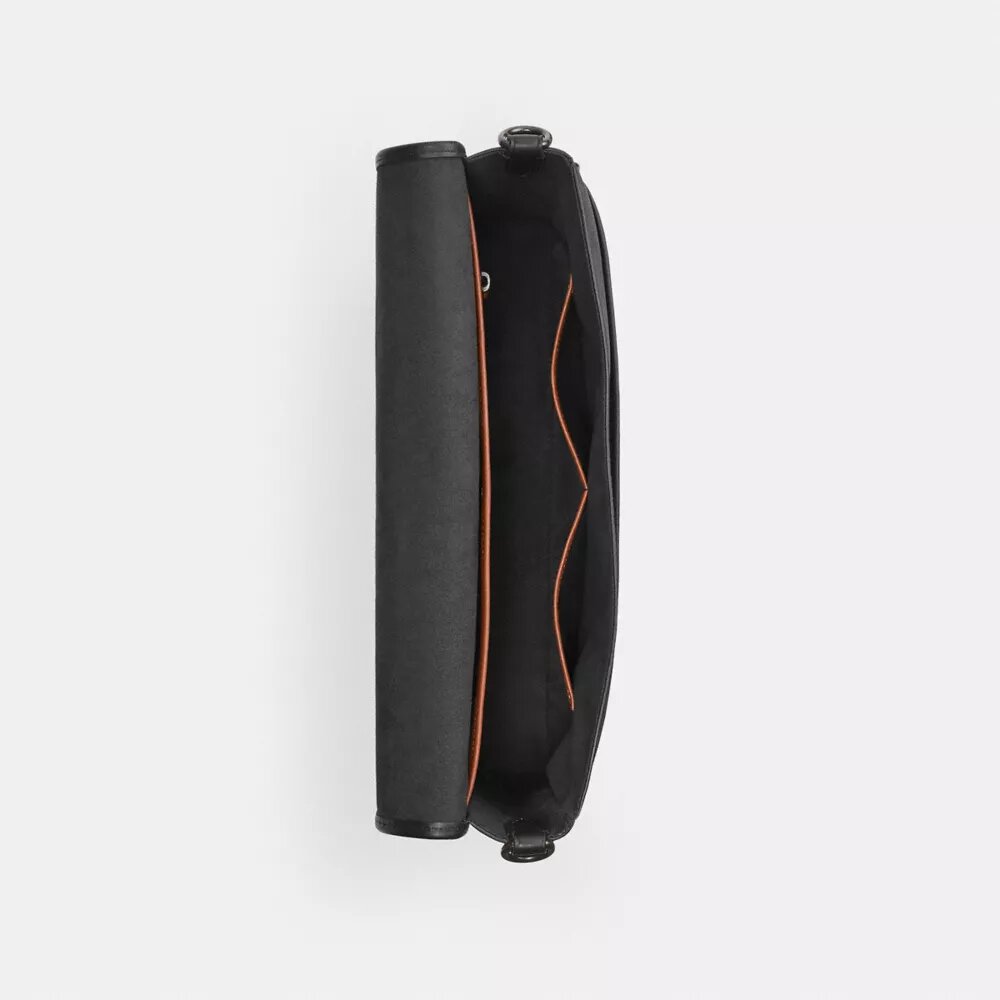 Hitch-messengertaske i Signature Canvas med patches