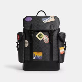 Hitch-rygsæk i Signature Canvas med patches