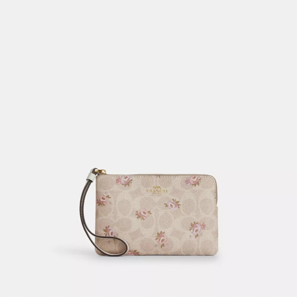 Håndledstaske med lynlås i hjørnet i Signature Canvas med blomsterprint
