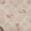 Håndledstaske med lynlås i hjørnet i Signature Canvas med blomsterprint