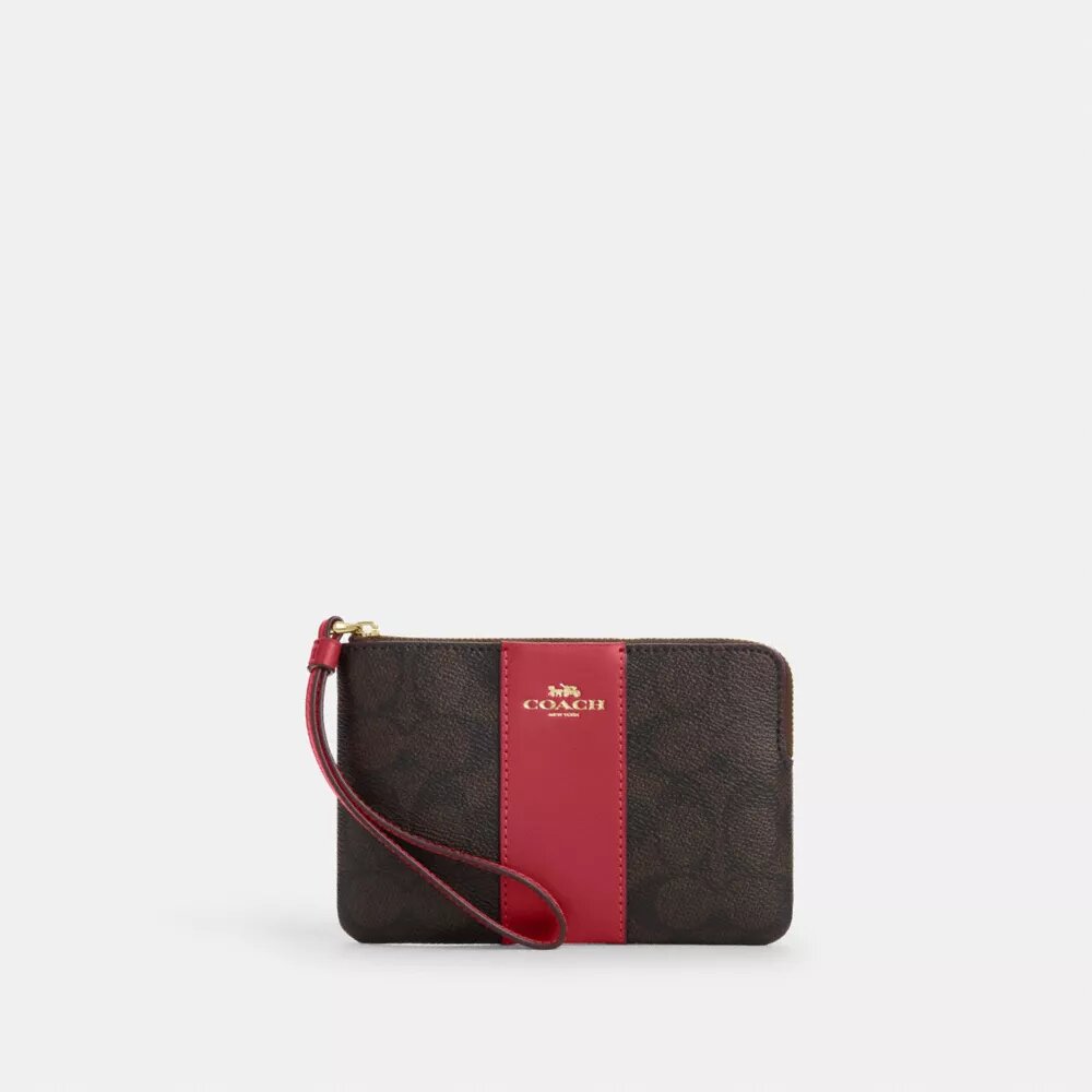 Håndledstasker med lynlås i hjørnet i Signature Canvas med striber