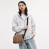 Jack Messenger-taske i Signature Canvas