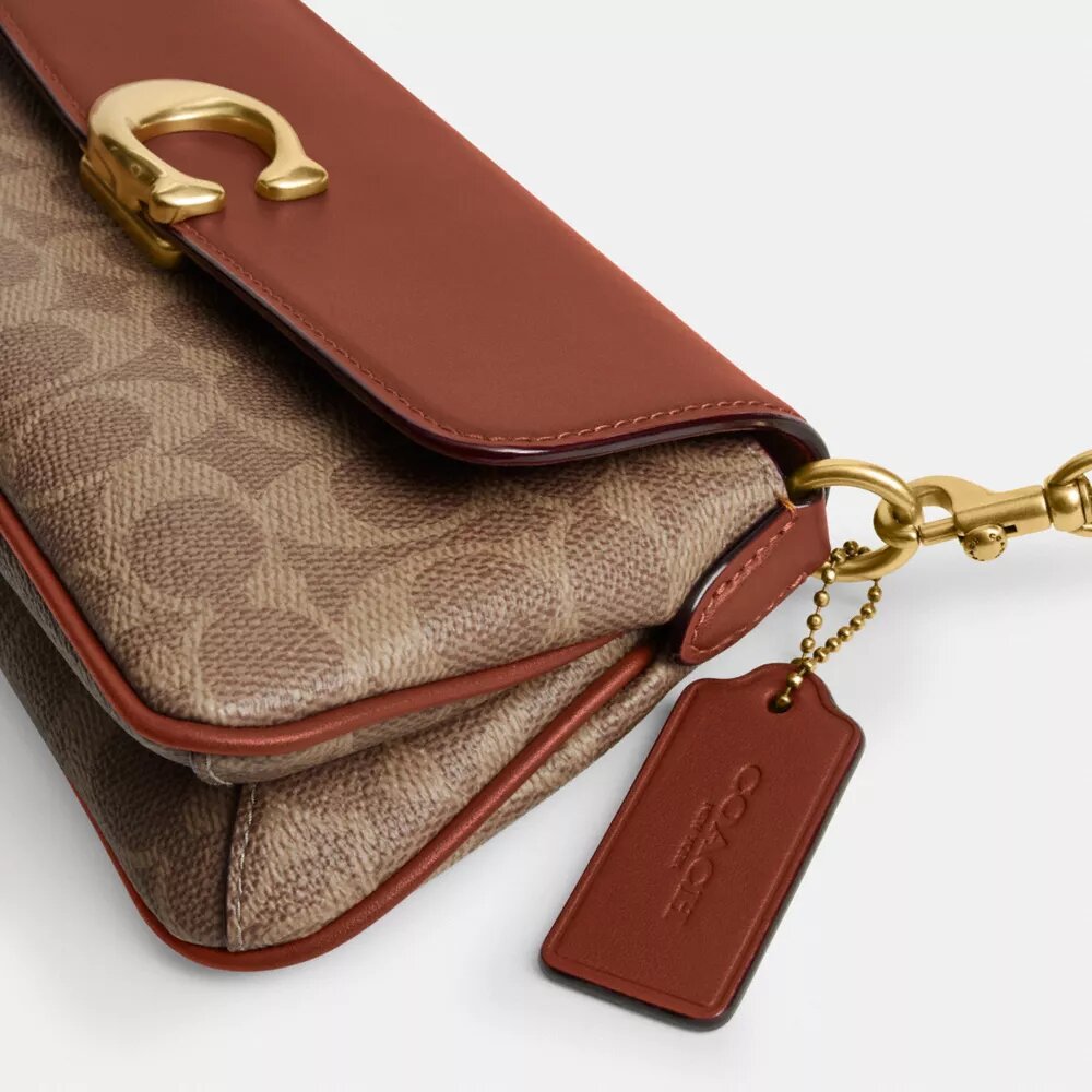 Jet skuldertaske i Signature Canvas