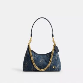 Juliet skuldertaske 25 i regenerativ bomuldsdenim med quiltning