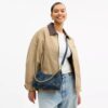 Juliet skuldertaske 25 i regenerativ bomuldsdenim med quiltning